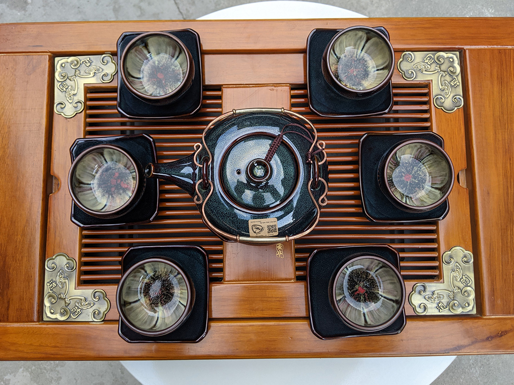 Bộ ấm chén Bát Tràng men hỏa biến dáng Giang Tây lòng chén hoa mặt trên