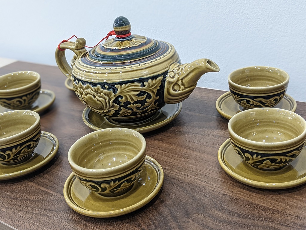 Bộ ấm chén uống trà khắc nổi hoa cổ 5
