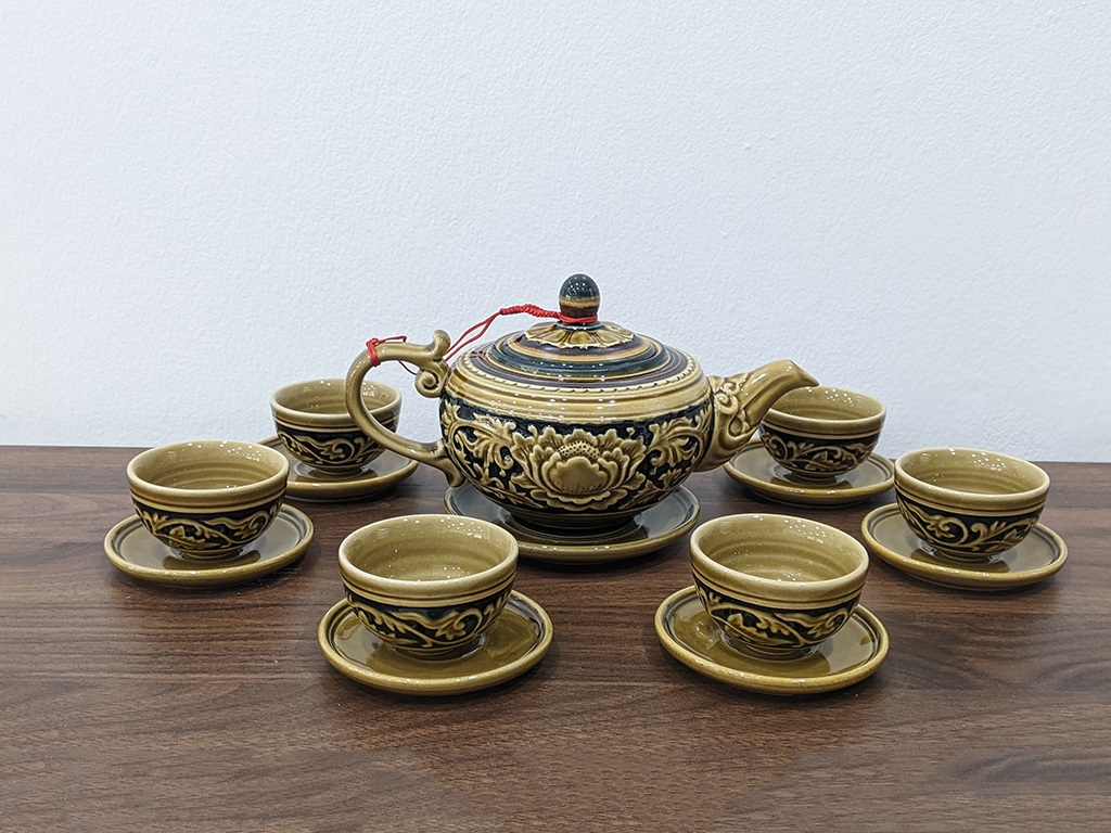 Bộ ấm chén uống trà khắc nổi hoa cổ 1
